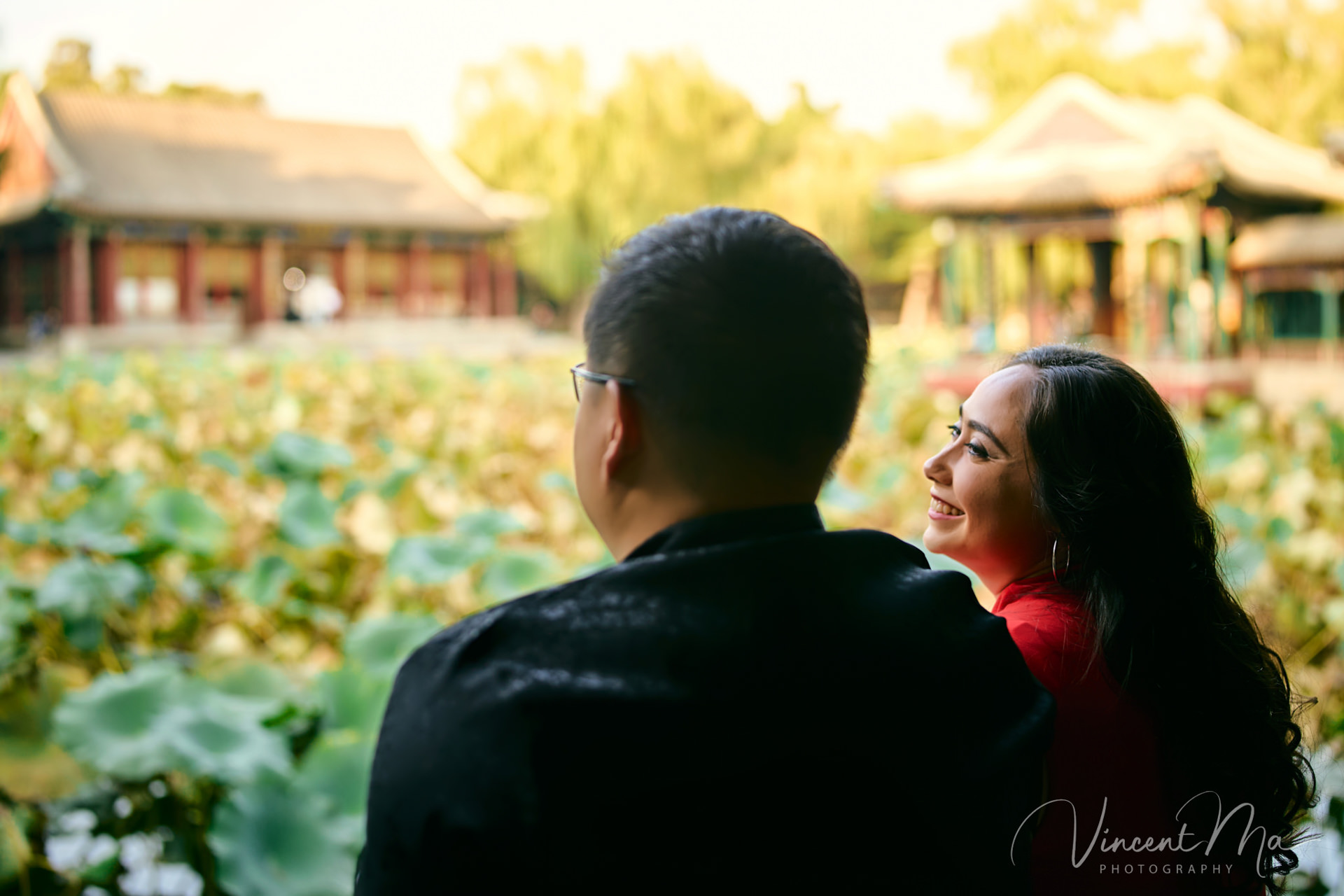A couple looking at each other with love in summer palace.