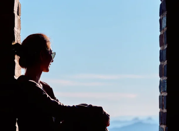 A panoramic view of the Mutianyu Great Wall during a family trip in the afternoon, showing the majestic wall winding through the mountains