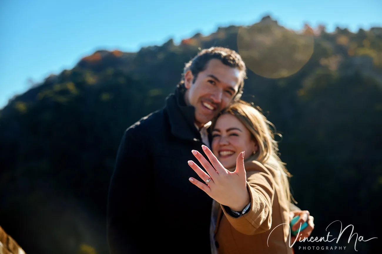 Man proposing to woman on Mutianyu Great Wall during autumn with mountains in background.Beijing photoshoot-Beijing photographer