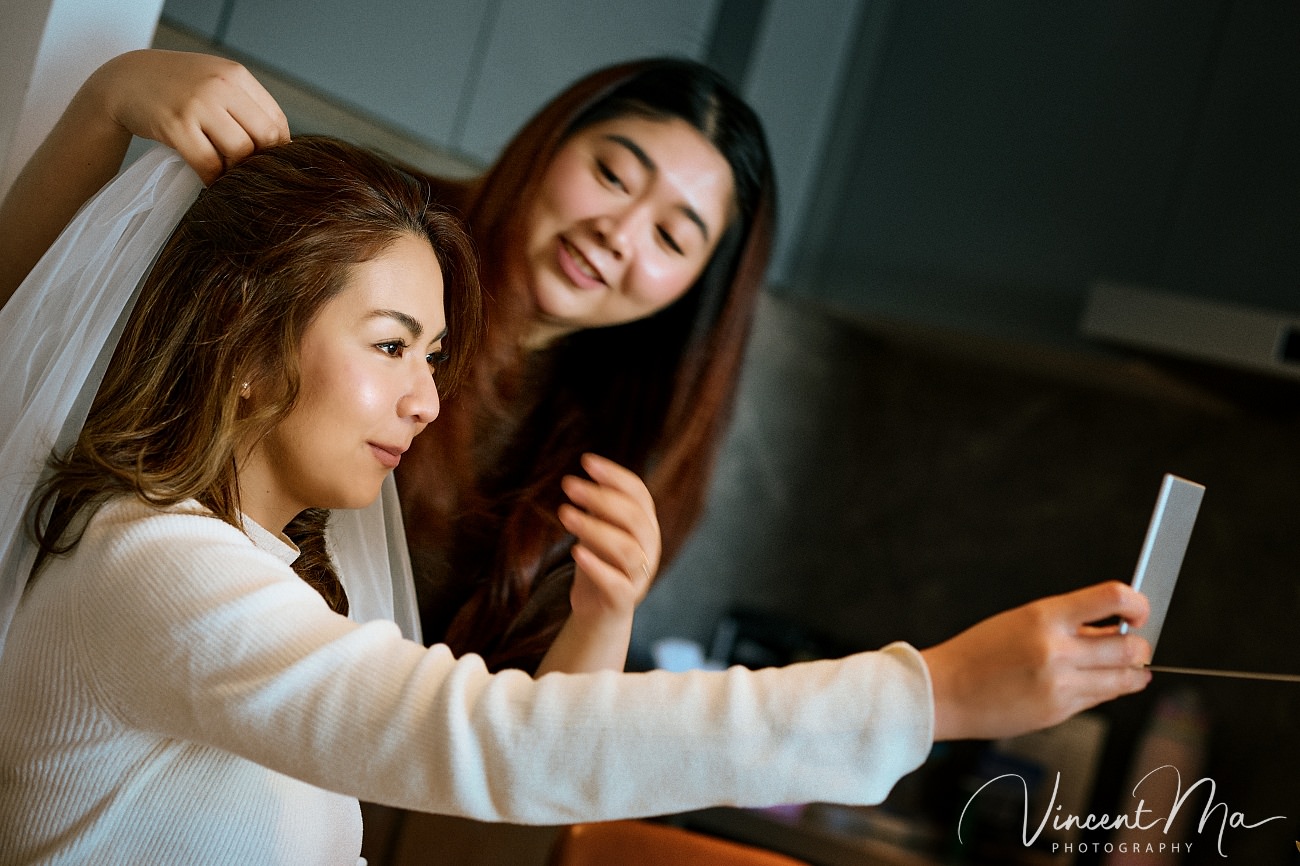 A cinematic and documentary photography series of Claire and April's same-sex winter elopement at Chongli Ski Resort, China. This minimalist wedding strips away traditional routines, featuring snowboarding in powder snow, intimate moments with their golden retrievers, and a legal online marriage ceremony via the Courtly platform by a cozy fireplace. Captured with a non-intrusive, lifestyle storytelling approach by Vincent Ma Visuals, a trusted LGBTQ-friendly photographer based in Beijing.