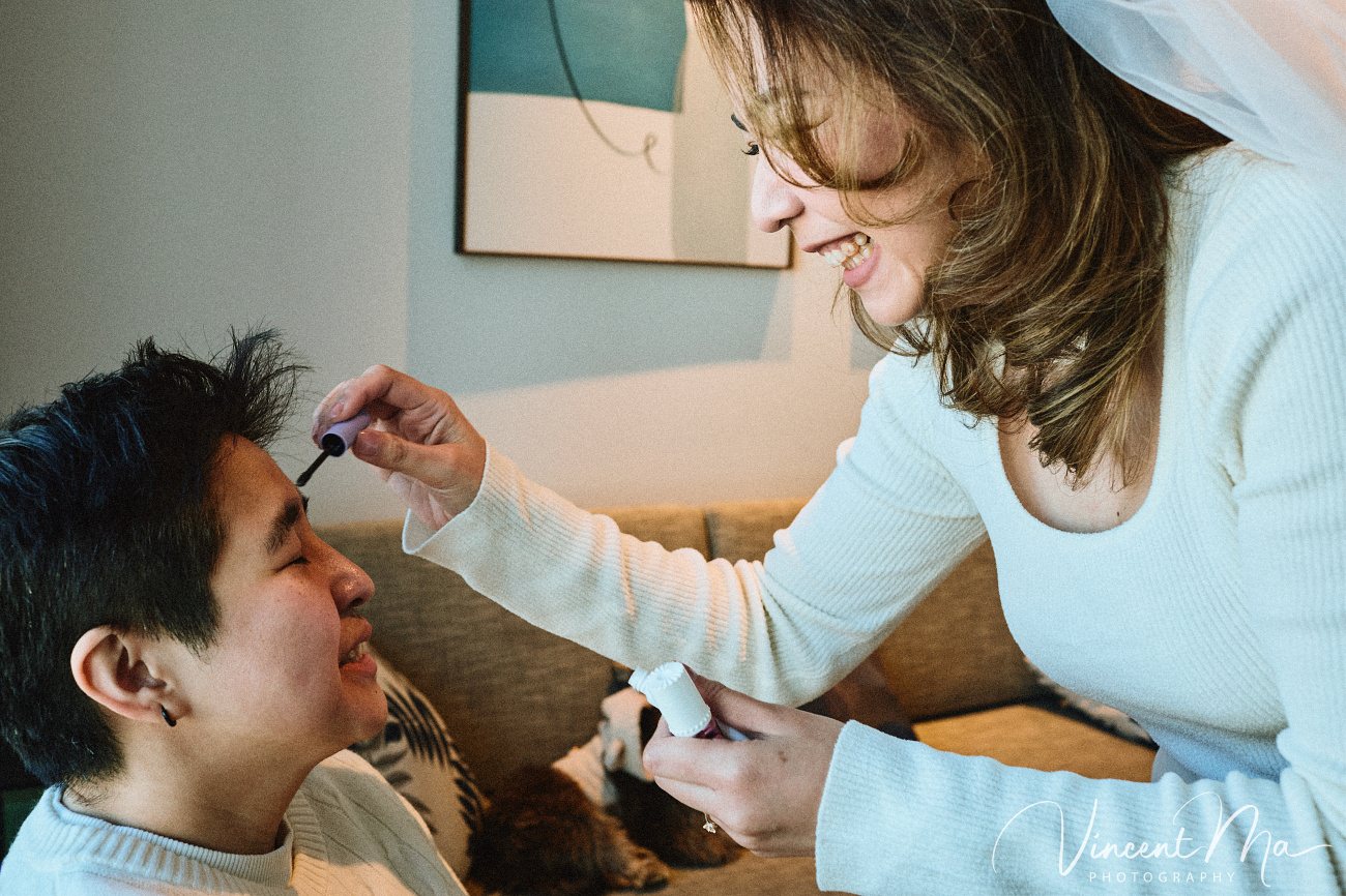 A cinematic and documentary photography series of Claire and April's same-sex winter elopement at Chongli Ski Resort, China. This minimalist wedding strips away traditional routines, featuring snowboarding in powder snow, intimate moments with their golden retrievers, and a legal online marriage ceremony via the Courtly platform by a cozy fireplace. Captured with a non-intrusive, lifestyle storytelling approach by Vincent Ma Visuals, a trusted LGBTQ-friendly photographer based in Beijing.