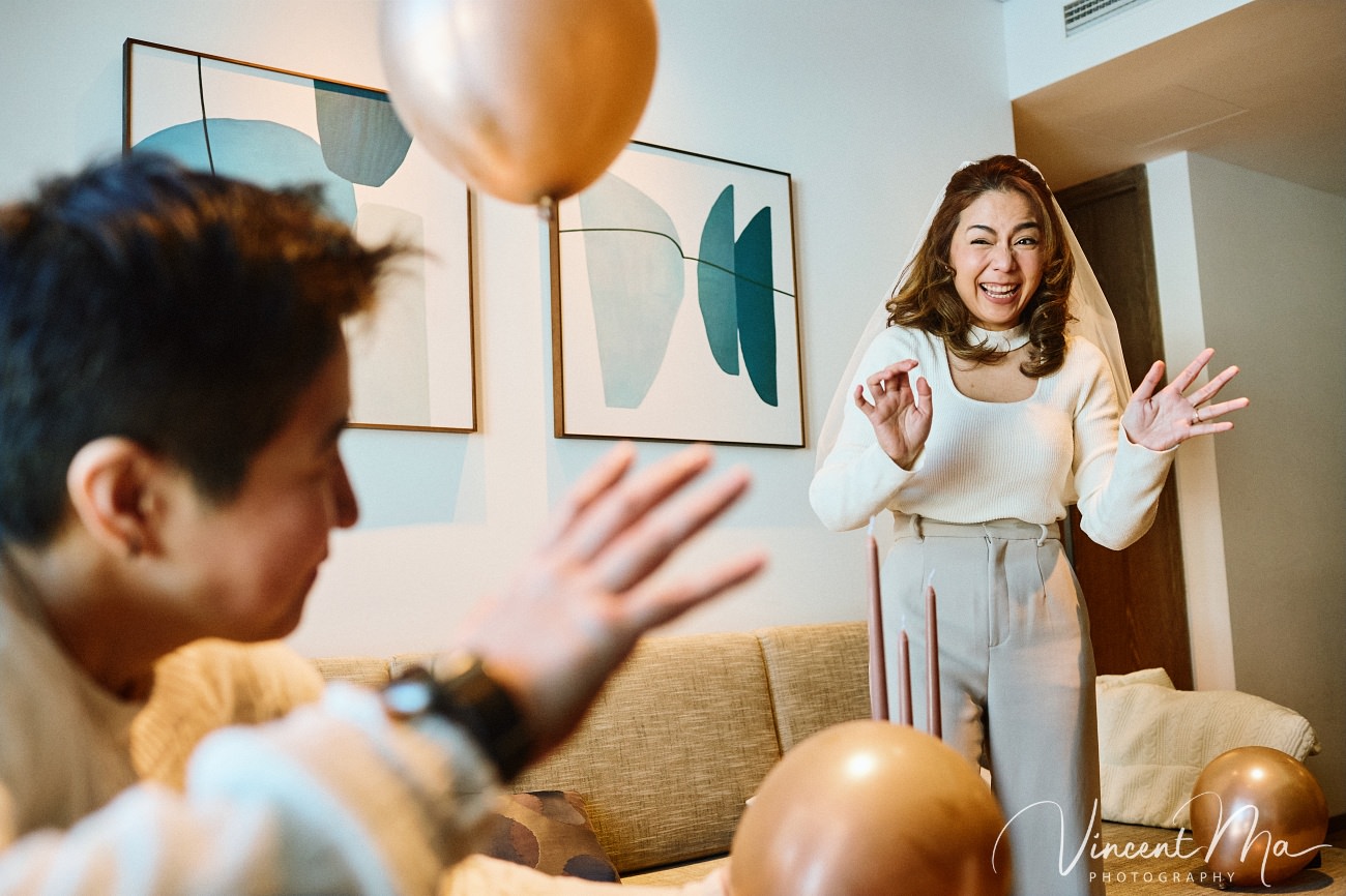 A cinematic and documentary photography series of Claire and April's same-sex winter elopement at Chongli Ski Resort, China. This minimalist wedding strips away traditional routines, featuring snowboarding in powder snow, intimate moments with their golden retrievers, and a legal online marriage ceremony via the Courtly platform by a cozy fireplace. Captured with a non-intrusive, lifestyle storytelling approach by Vincent Ma Visuals, a trusted LGBTQ-friendly photographer based in Beijing.