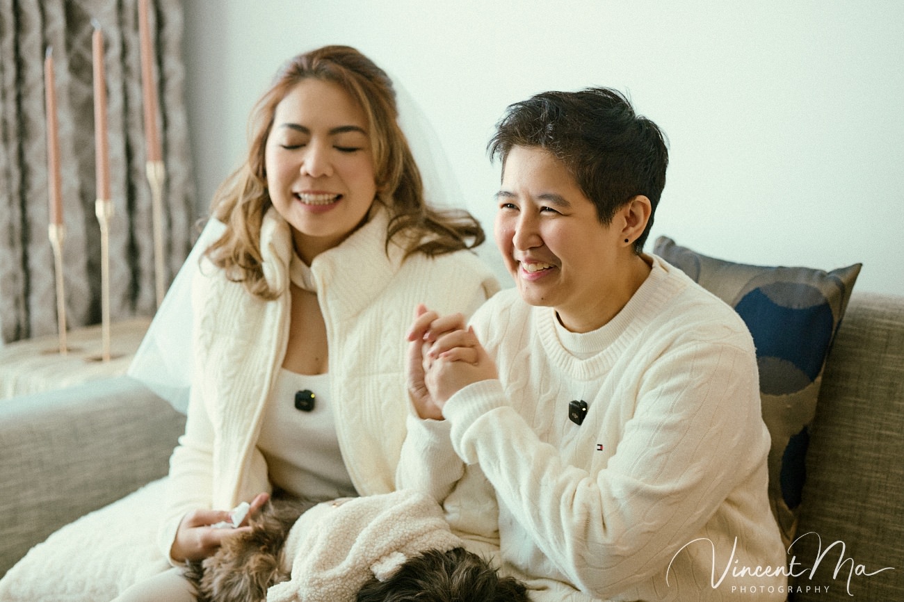 A cinematic and documentary photography series of Claire and April's same-sex winter elopement at Chongli Ski Resort, China. This minimalist wedding strips away traditional routines, featuring snowboarding in powder snow, intimate moments with their golden retrievers, and a legal online marriage ceremony via the Courtly platform by a cozy fireplace. Captured with a non-intrusive, lifestyle storytelling approach by Vincent Ma Visuals, a trusted LGBTQ-friendly photographer based in Beijing.