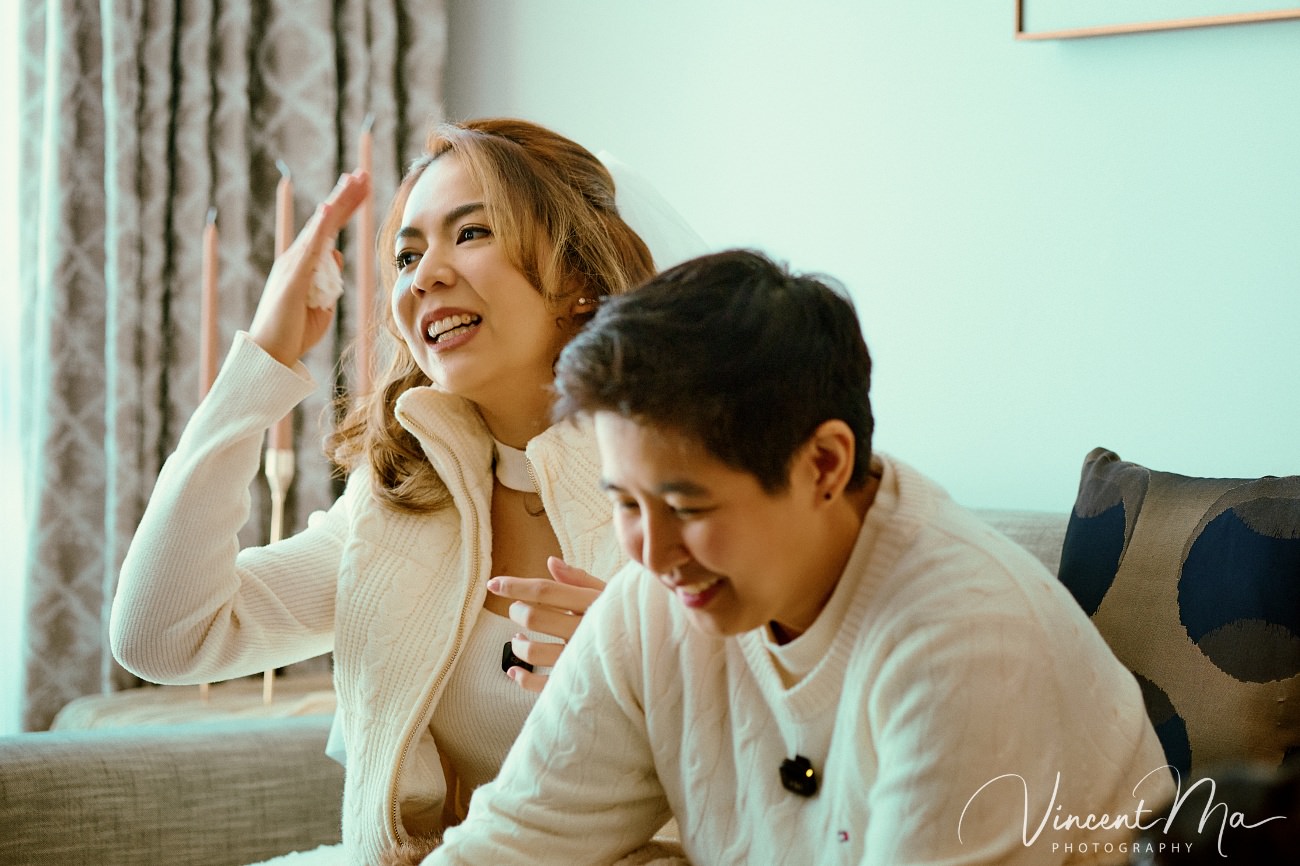 A cinematic and documentary photography series of Claire and April's same-sex winter elopement at Chongli Ski Resort, China. This minimalist wedding strips away traditional routines, featuring snowboarding in powder snow, intimate moments with their golden retrievers, and a legal online marriage ceremony via the Courtly platform by a cozy fireplace. Captured with a non-intrusive, lifestyle storytelling approach by Vincent Ma Visuals, a trusted LGBTQ-friendly photographer based in Beijing.