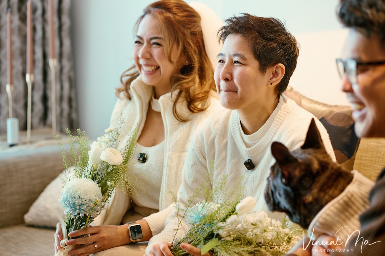 A cinematic and documentary photography series of Claire and April's same-sex winter elopement at Chongli Ski Resort, China. This minimalist wedding strips away traditional routines, featuring snowboarding in powder snow, intimate moments with their golden retrievers, and a legal online marriage ceremony via the Courtly platform by a cozy fireplace. Captured with a non-intrusive, lifestyle storytelling approach by Vincent Ma Visuals, a trusted LGBTQ-friendly photographer based in Beijing.