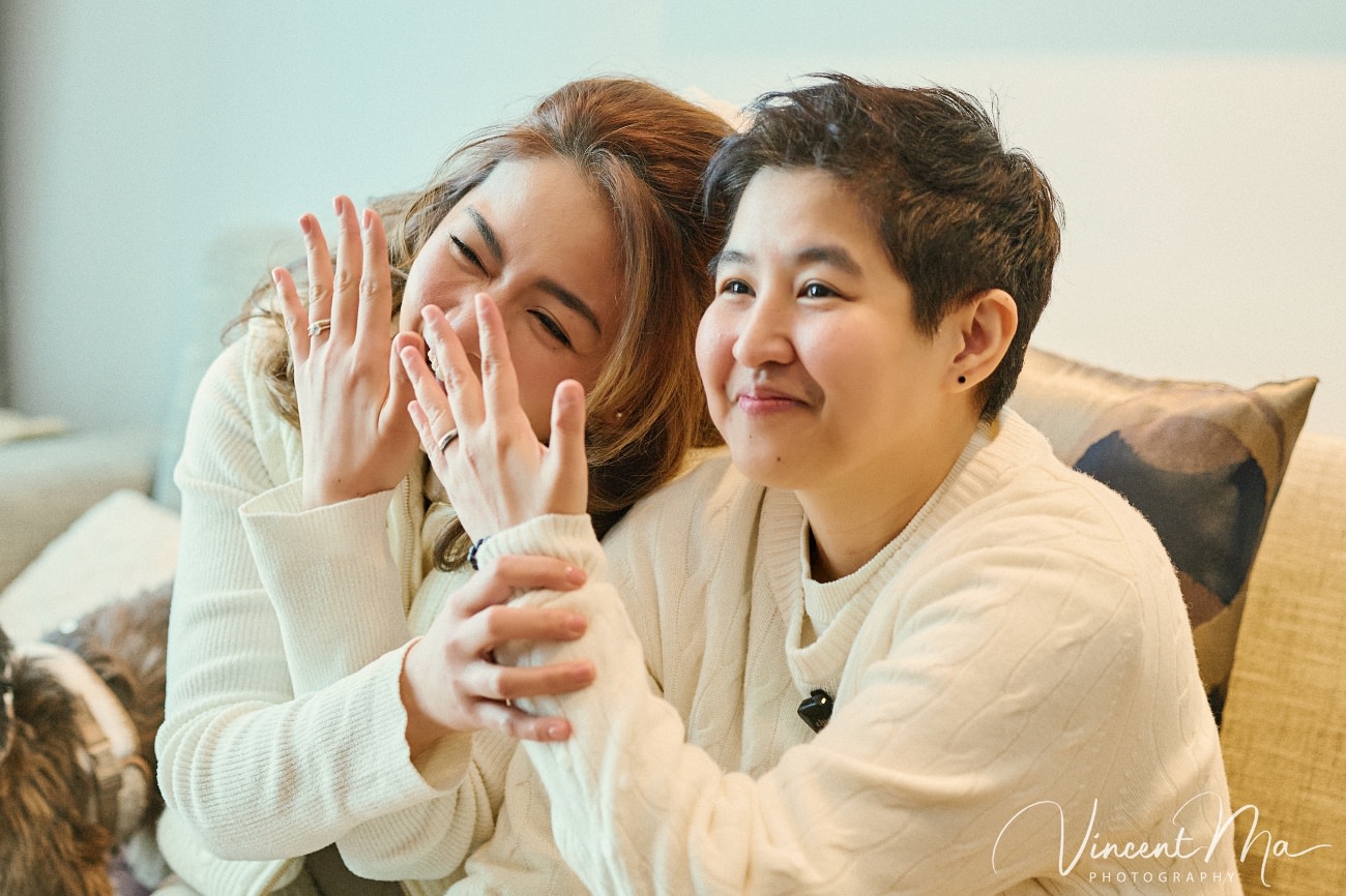 A cinematic and documentary photography series of Claire and April's same-sex winter elopement at Chongli Ski Resort, China. This minimalist wedding strips away traditional routines, featuring snowboarding in powder snow, intimate moments with their golden retrievers, and a legal online marriage ceremony via the Courtly platform by a cozy fireplace. Captured with a non-intrusive, lifestyle storytelling approach by Vincent Ma Visuals, a trusted LGBTQ-friendly photographer based in Beijing.