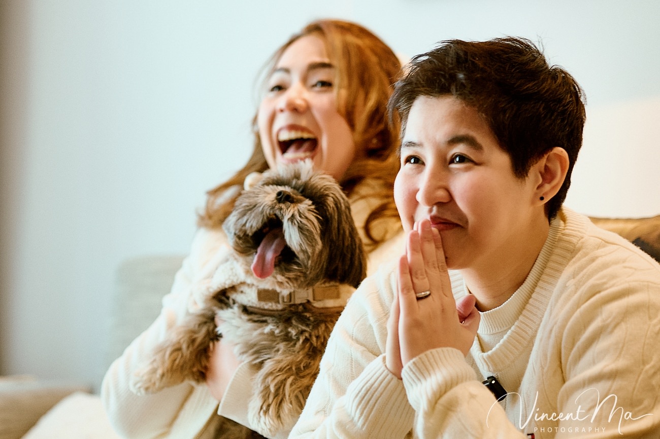 A cinematic and documentary photography series of Claire and April's same-sex winter elopement at Chongli Ski Resort, China. This minimalist wedding strips away traditional routines, featuring snowboarding in powder snow, intimate moments with their golden retrievers, and a legal online marriage ceremony via the Courtly platform by a cozy fireplace. Captured with a non-intrusive, lifestyle storytelling approach by Vincent Ma Visuals, a trusted LGBTQ-friendly photographer based in Beijing.