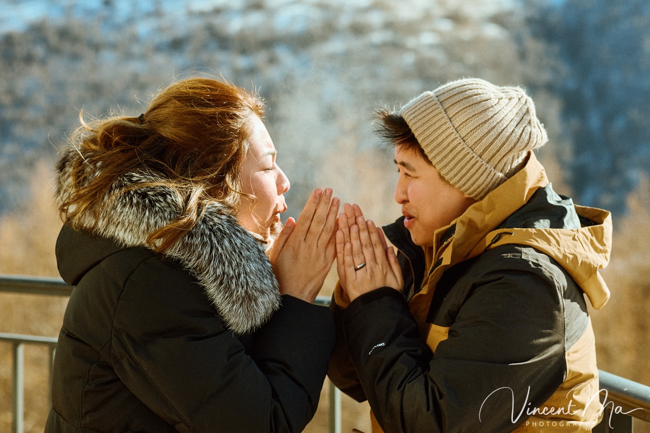 A cinematic and documentary photography series of Claire and April's same-sex winter elopement at Chongli Ski Resort, China. This minimalist wedding strips away traditional routines, featuring snowboarding in powder snow, intimate moments with their golden retrievers, and a legal online marriage ceremony via the Courtly platform by a cozy fireplace. Captured with a non-intrusive, lifestyle storytelling approach by Vincent Ma Visuals, a trusted LGBTQ-friendly photographer based in Beijing.
