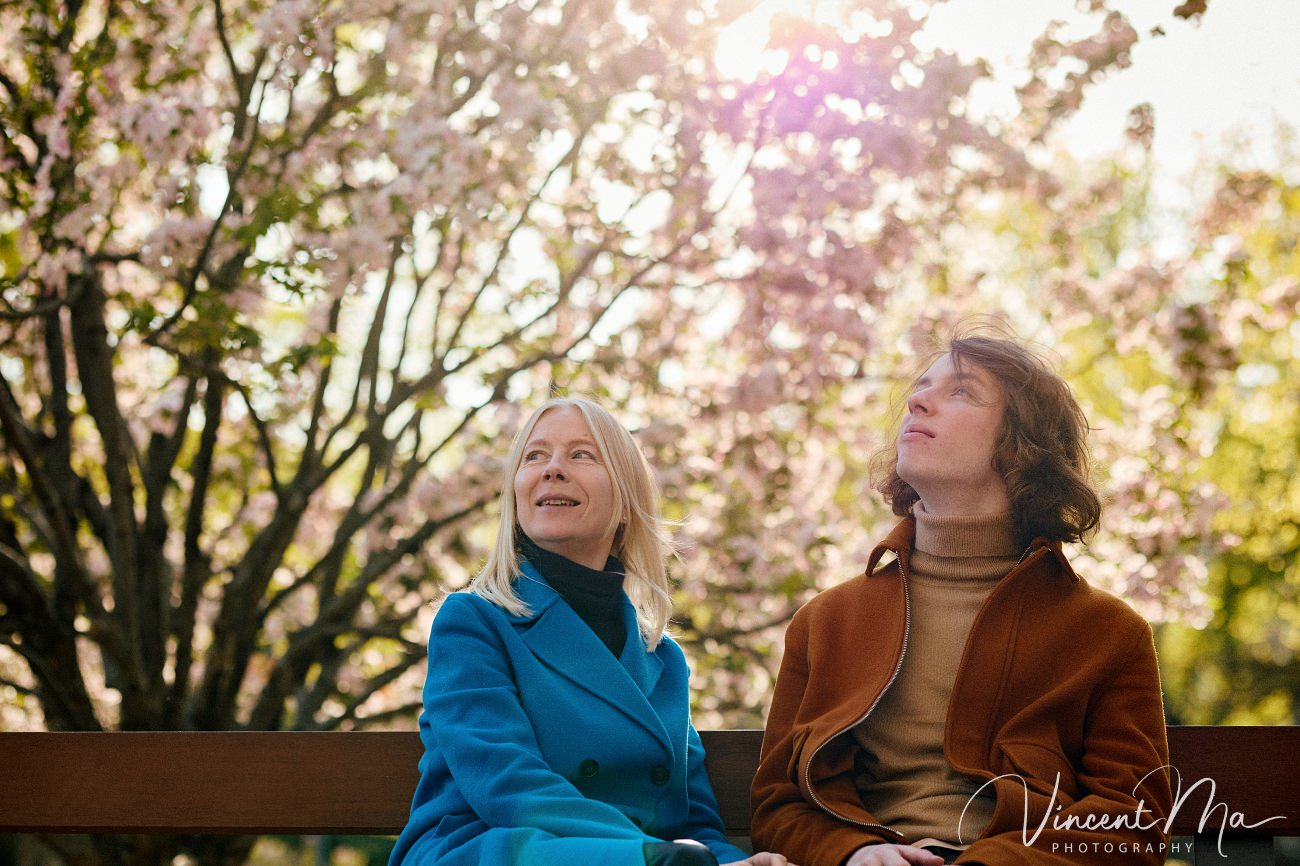 Mother and son from Germany enjoying spring blossoms at Ritan Park Beijing photoshoot