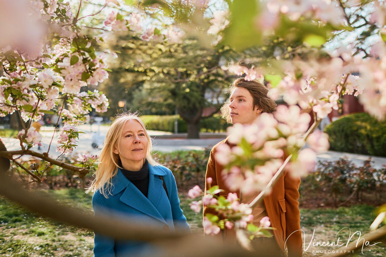 Mother and son from Germany enjoying spring blossoms at Ritan Park Beijing photoshoot