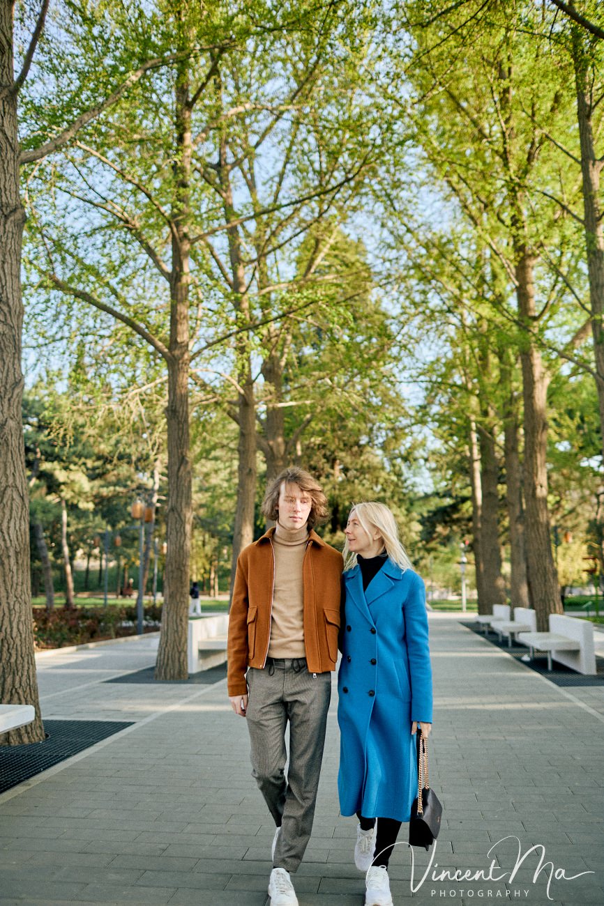 Candid emotional moment between mother and son during a vacation photoshoot in China.