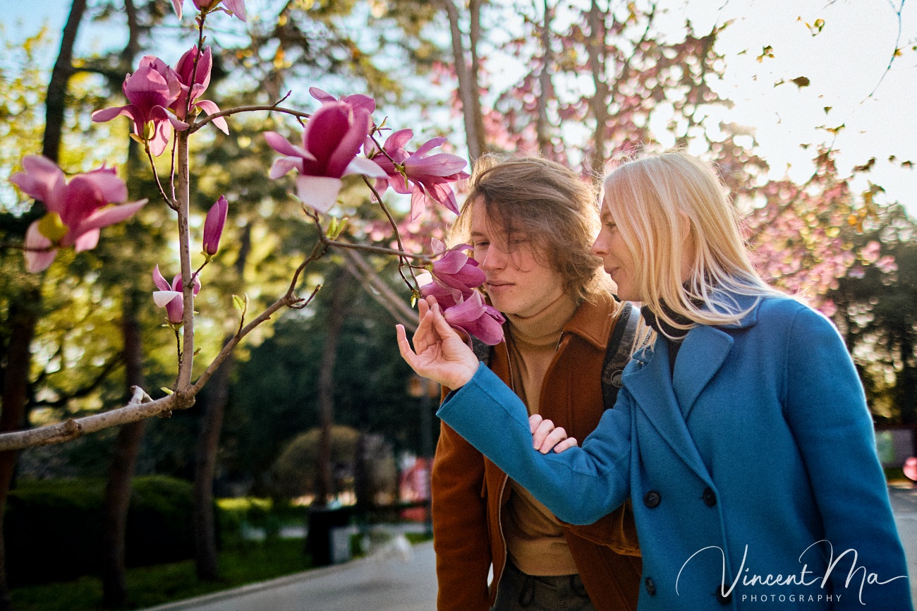 Mother and son from Germany enjoying spring blossoms at Ritan Park Beijing photoshoot