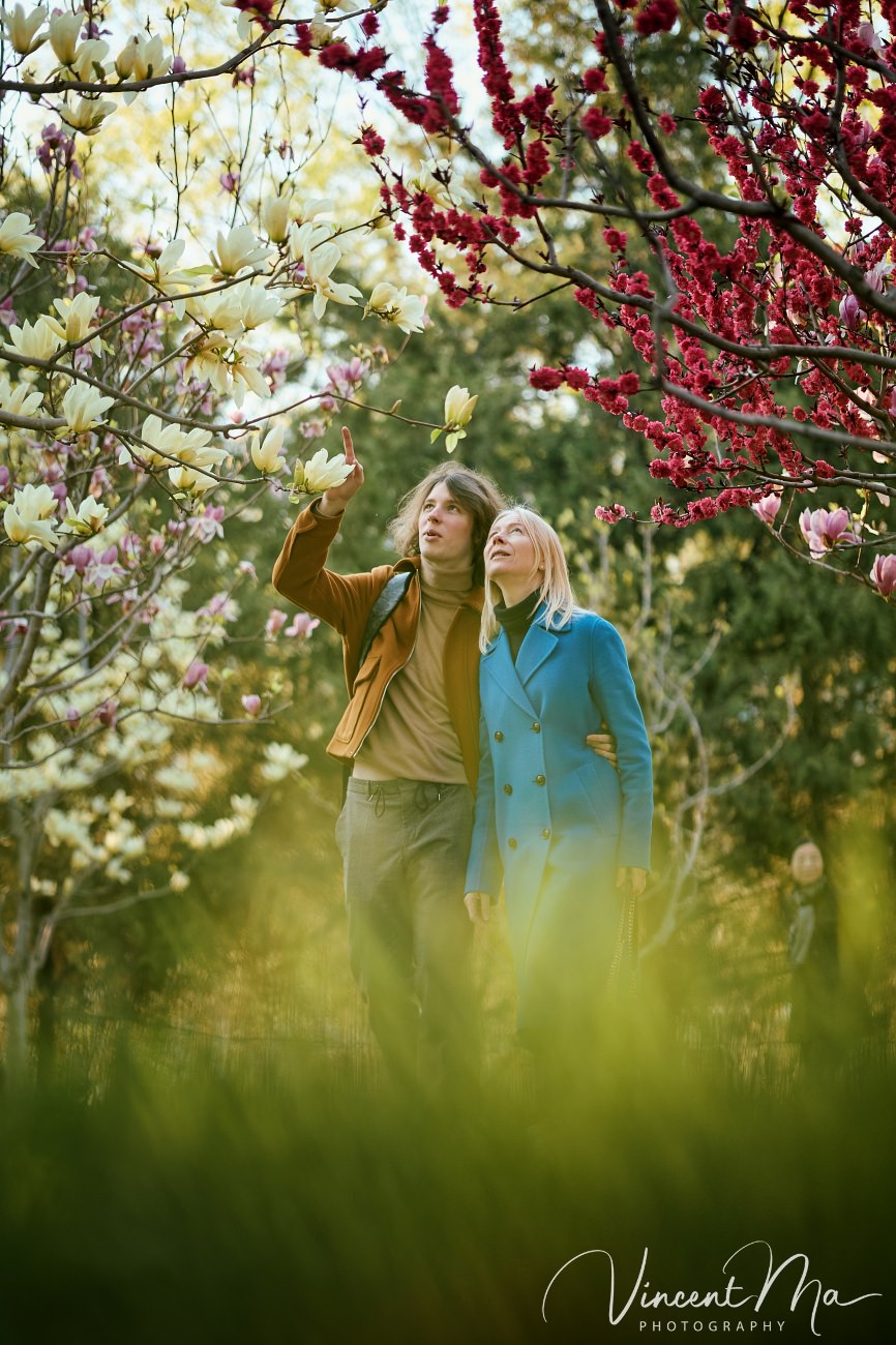 Mother and son from Germany enjoying spring blossoms at Ritan Park Beijing photoshoot