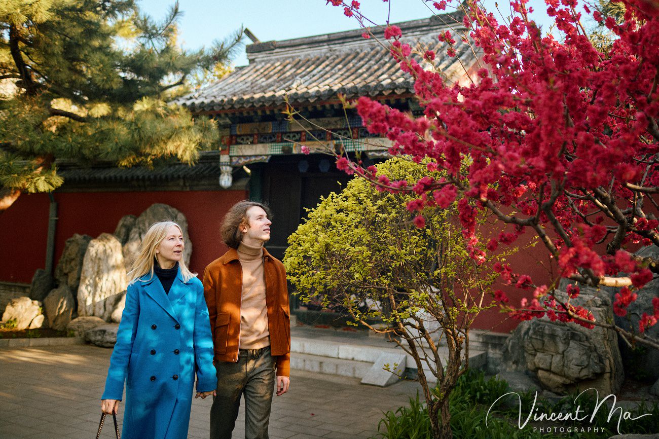 Candid emotional moment between mother and son during a vacation photoshoot in China.