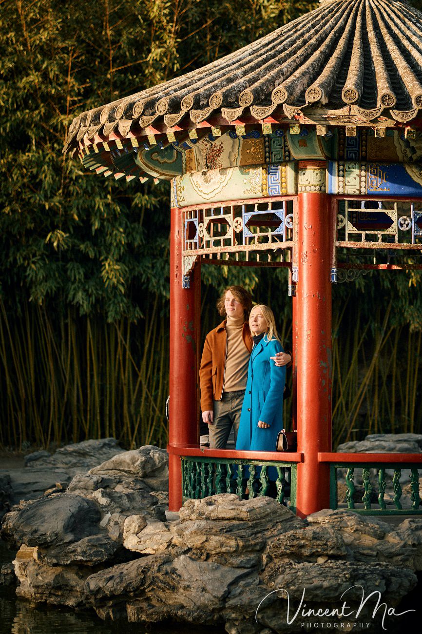 Candid emotional moment between mother and son during a vacation photoshoot in China.