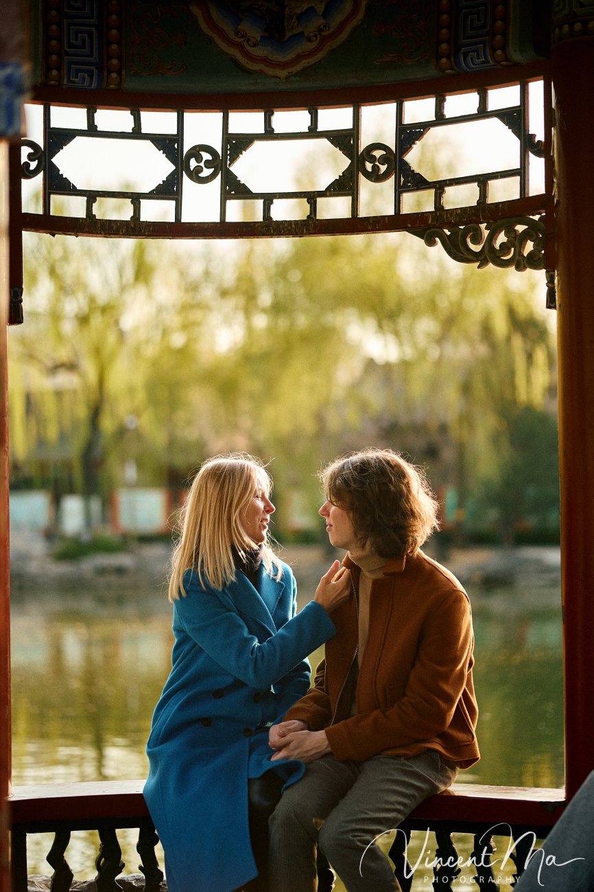 Candid emotional moment between mother and son during a vacation photoshoot in China.
