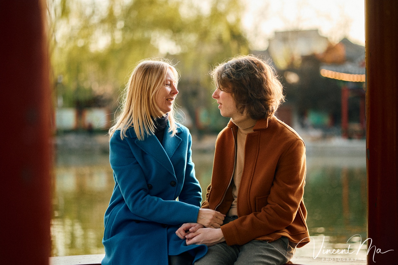 Candid emotional moment between mother and son during a vacation photoshoot in China.