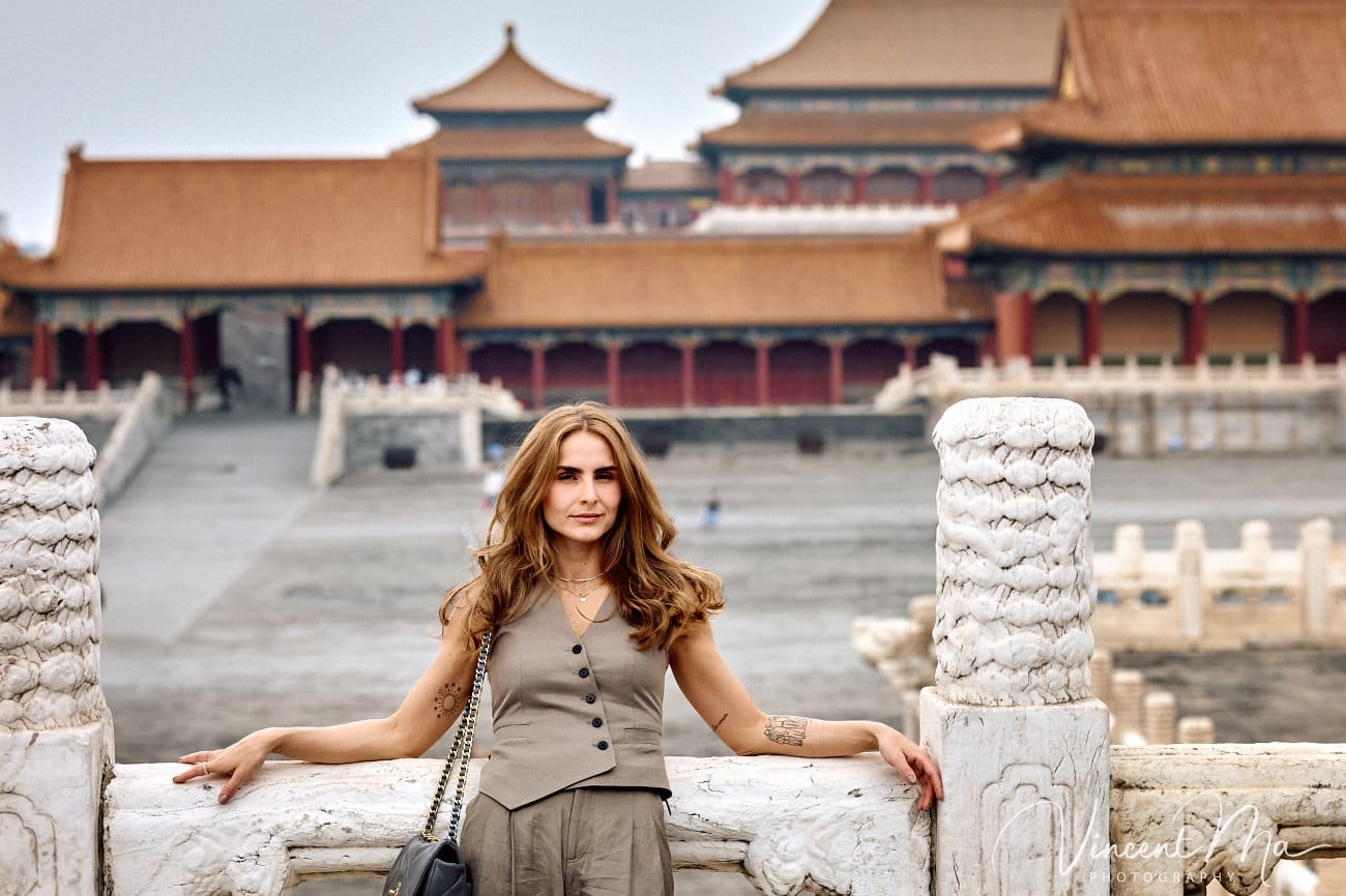 Cinematic personal portraits at the Forbidden City red walls by Vincent Ma Visuals.