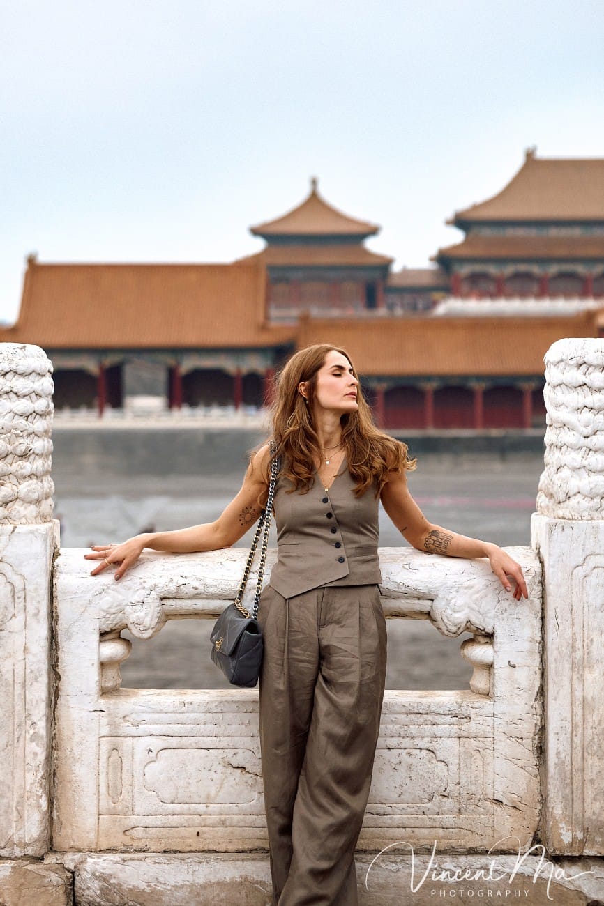 Cinematic personal portraits at the Forbidden City red walls by Vincent Ma Visuals.