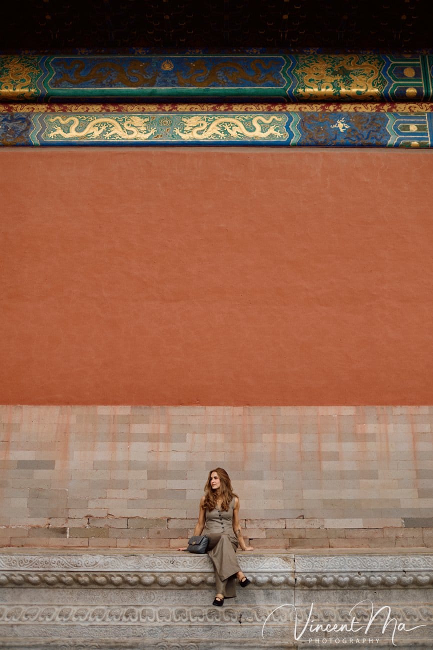 Cinematic personal portraits at the Forbidden City red walls by Vincent Ma Visuals.