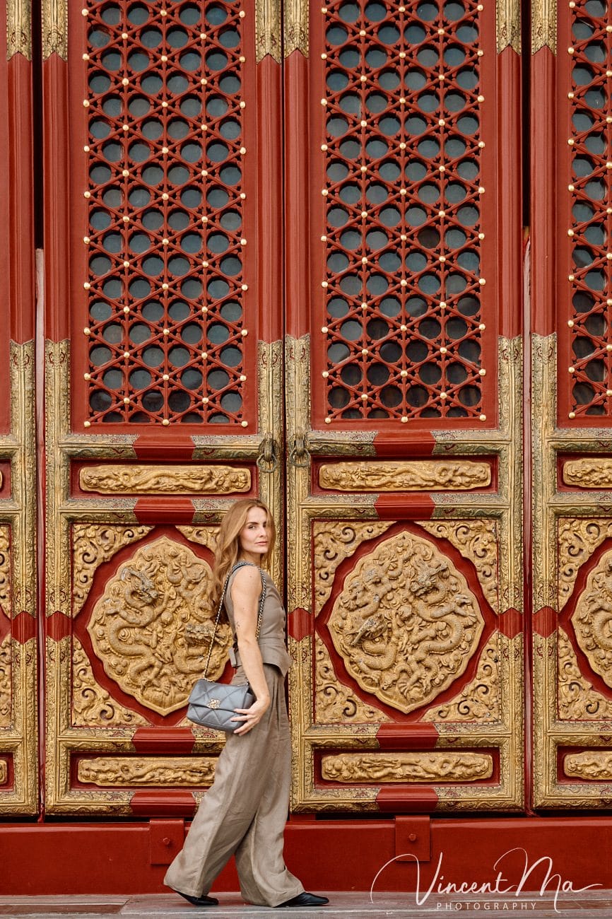 Cinematic personal portraits at the Forbidden City red walls by Vincent Ma Visuals.