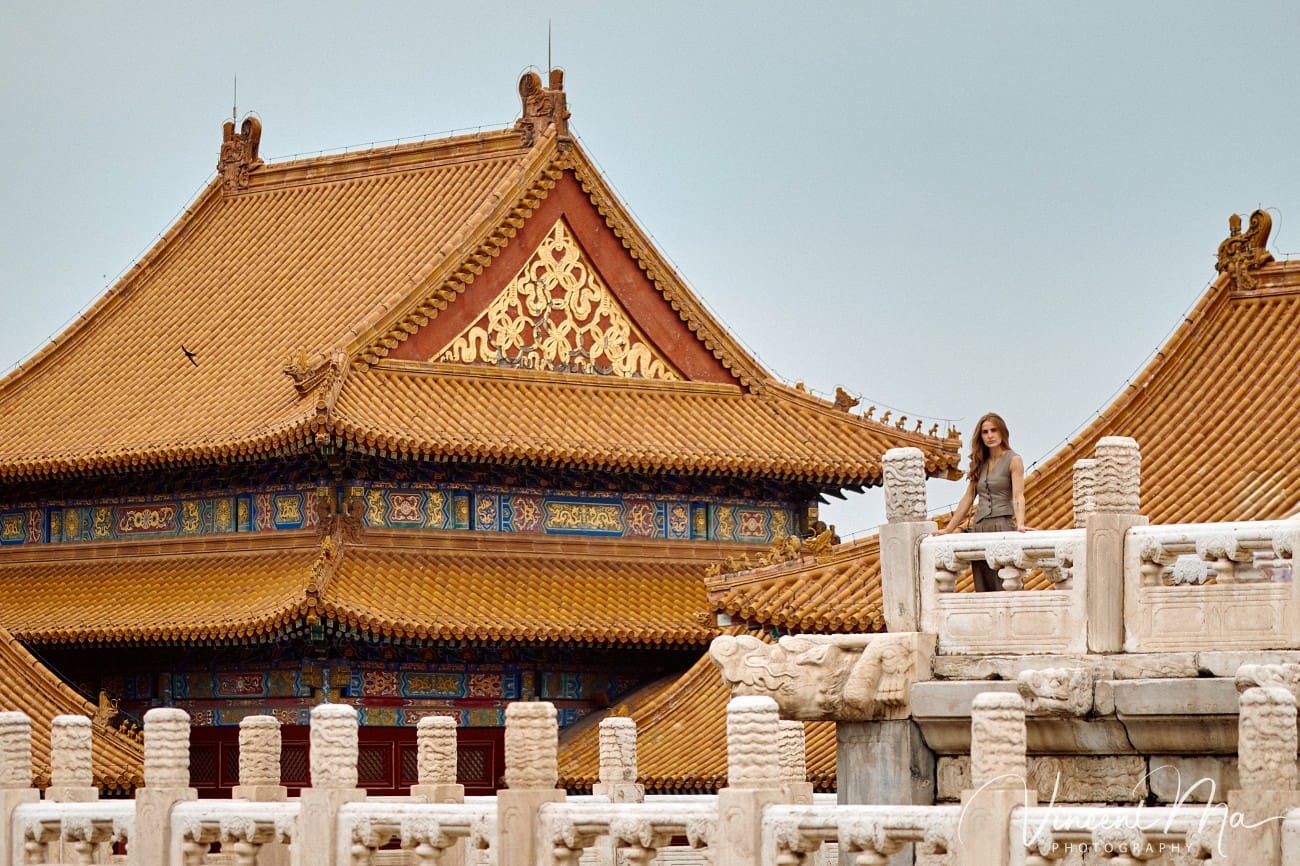 Cinematic personal portraits at the Forbidden City red walls by Vincent Ma Visuals.