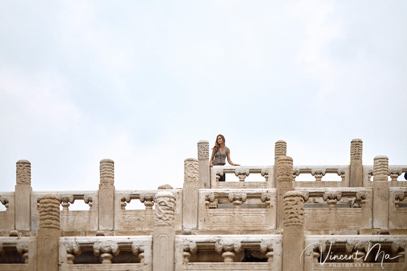 Cinematic personal portraits at the Forbidden City red walls by Vincent Ma Visuals.