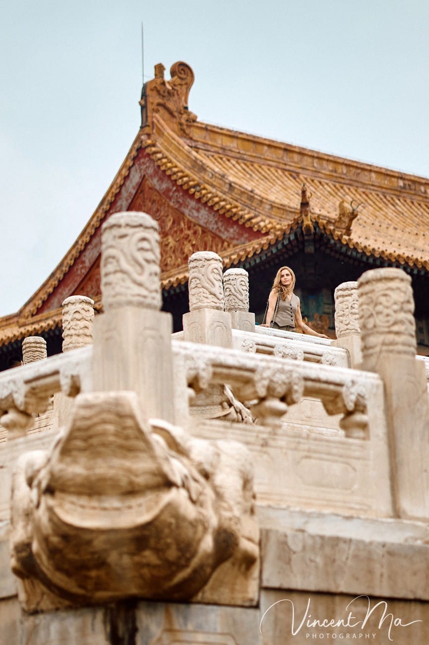 Cinematic personal portraits at the Forbidden City red walls by Vincent Ma Visuals.