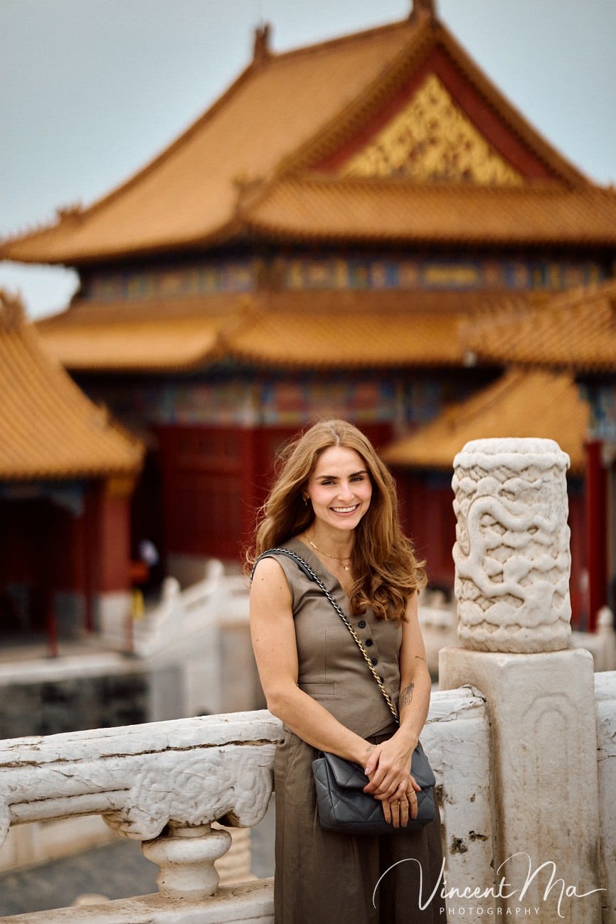 Cinematic personal portraits at the Forbidden City red walls by Vincent Ma Visuals.