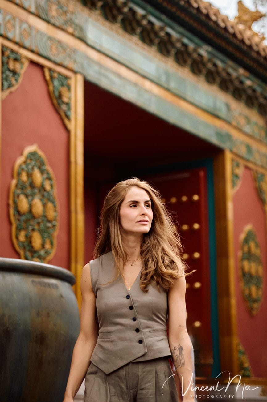 Cinematic personal portraits at the Forbidden City red walls by Vincent Ma Visuals.