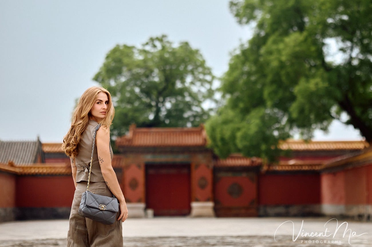 Cinematic personal portraits at the Forbidden City red walls by Vincent Ma Visuals.