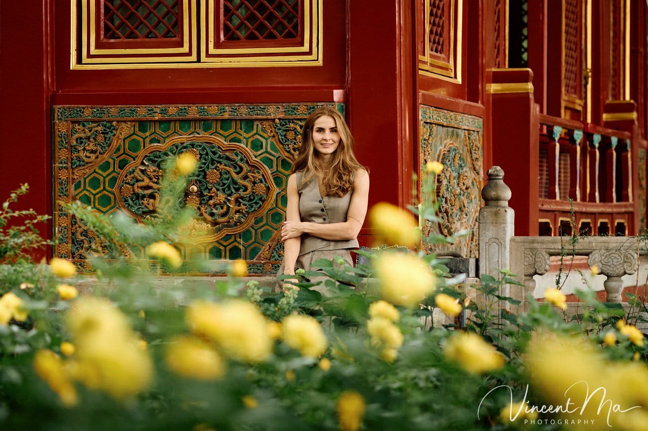 Cinematic personal portraits at the Forbidden City red walls by Vincent Ma Visuals.
