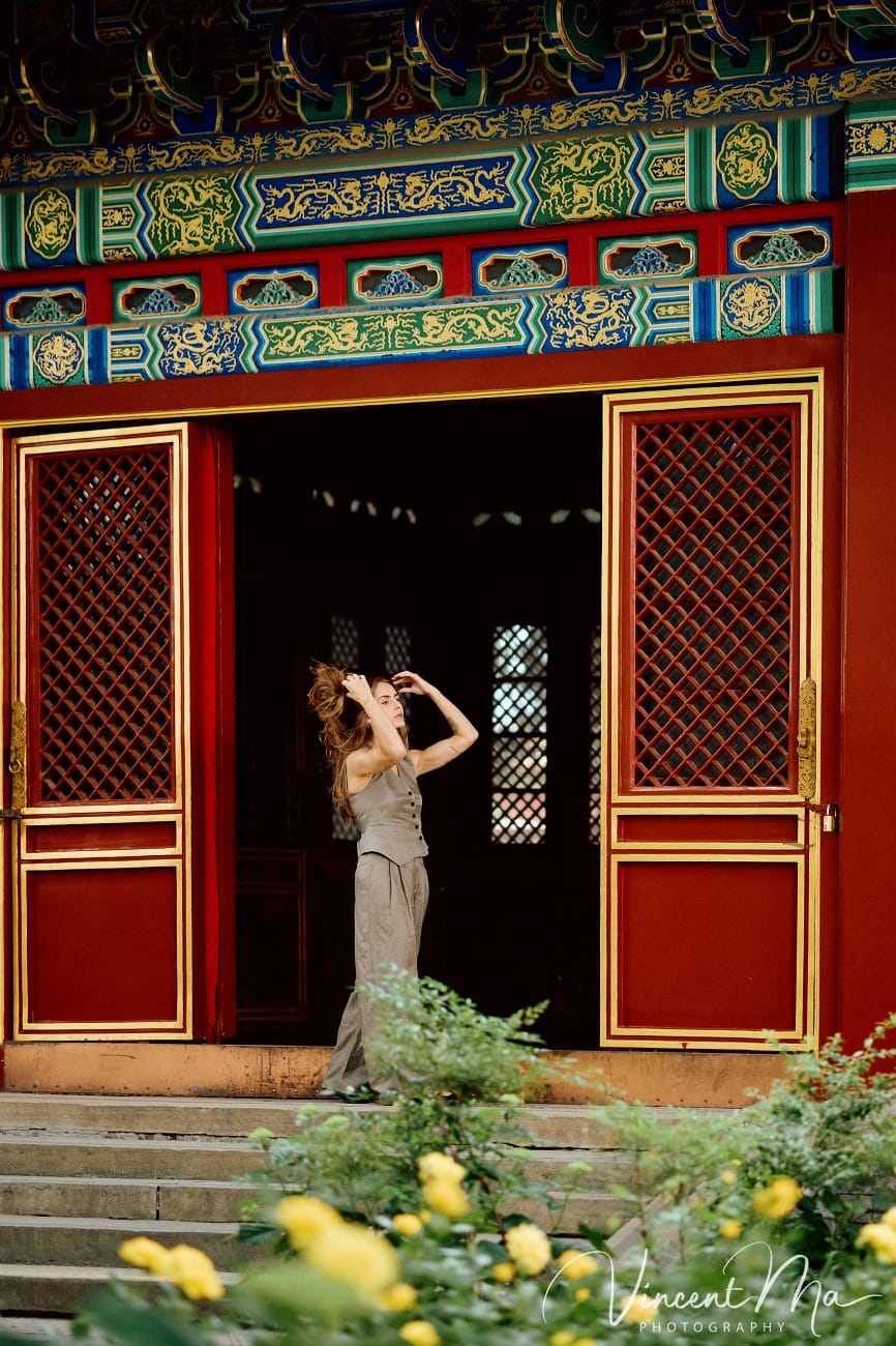 Cinematic personal portraits at the Forbidden City red walls by Vincent Ma Visuals.