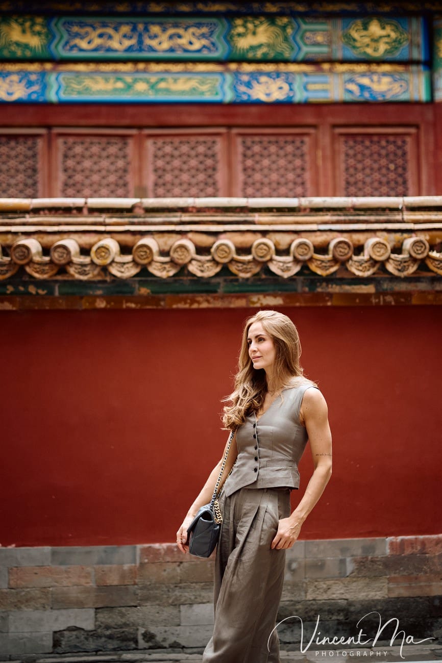 Cinematic personal portraits at the Forbidden City red walls by Vincent Ma Visuals.