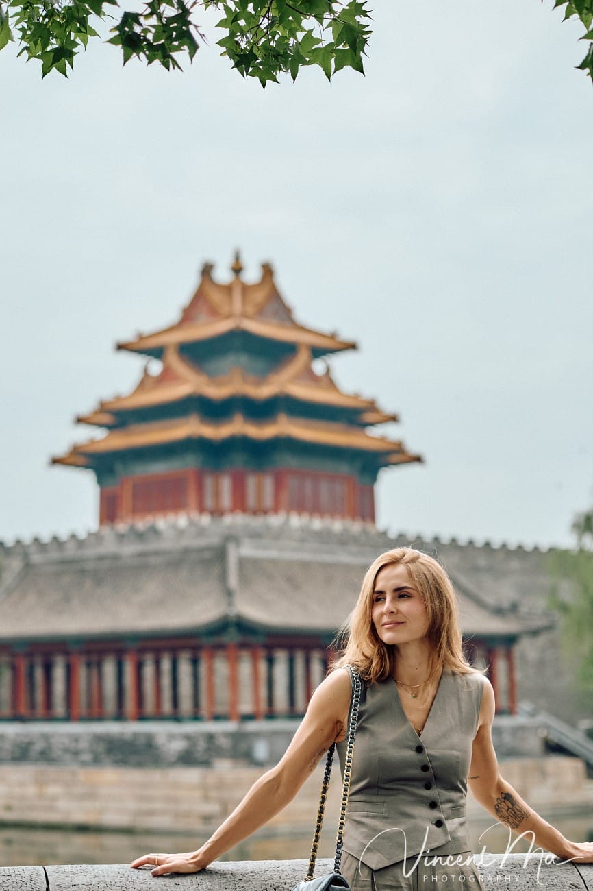 Cinematic personal portraits at the Forbidden City red walls by Vincent Ma Visuals.