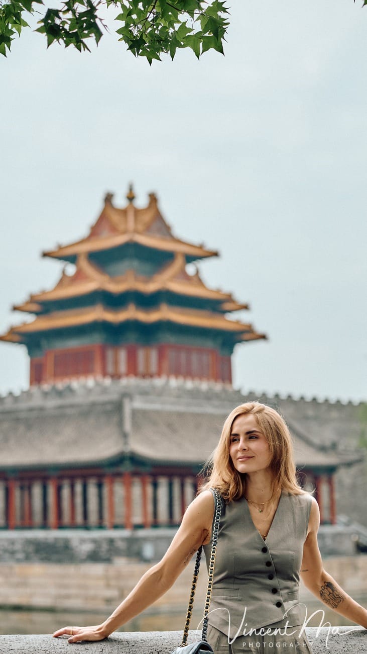 Cinematic personal portraits at the Forbidden City red walls by Vincent Ma Visuals.