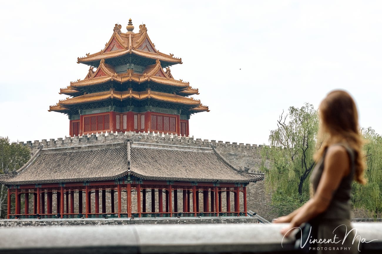 Cinematic personal portraits at the Forbidden City red walls by Vincent Ma Visuals.