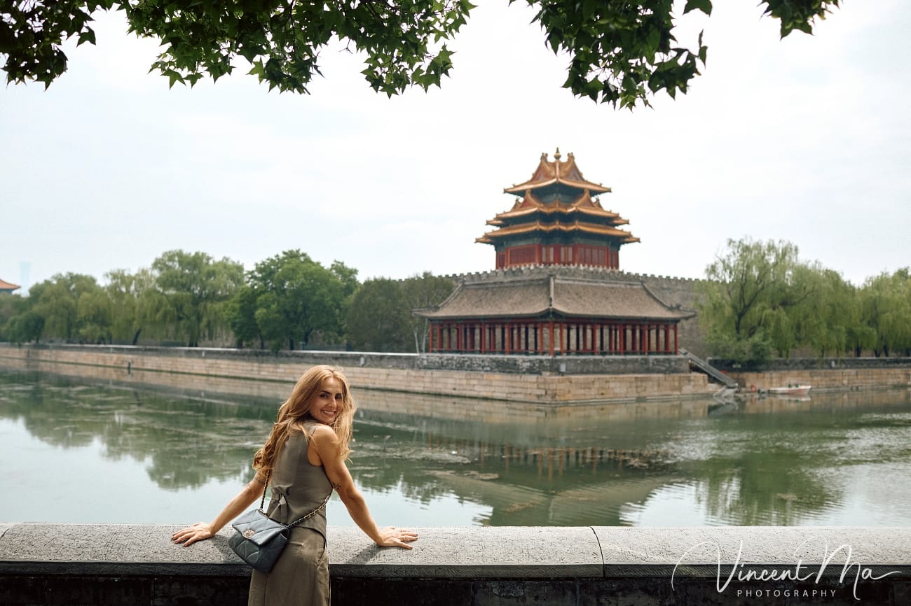 Cinematic personal portraits at the Forbidden City red walls by Vincent Ma Visuals.